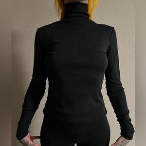Thin black turtleneck